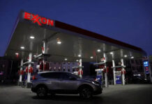 Exxon reports a record first-quarter profit on higher output